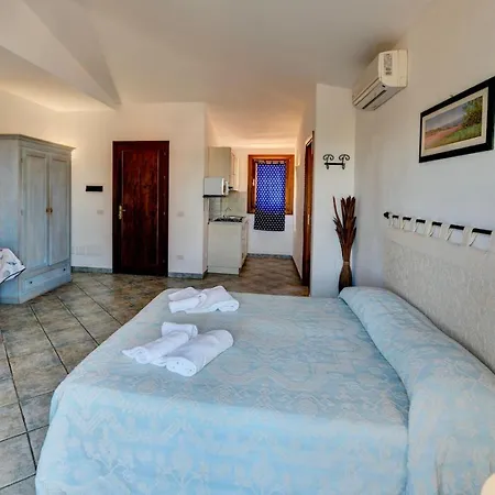 מלון דירות Isa-apartments With Air Conditioning And Outdoor Private Space In With Swimming-pool In Palau, Only 150 Meters From The Sea